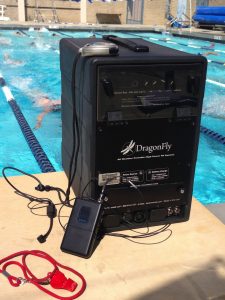 technomad dragonfly portable pa being used for poolside swim practice