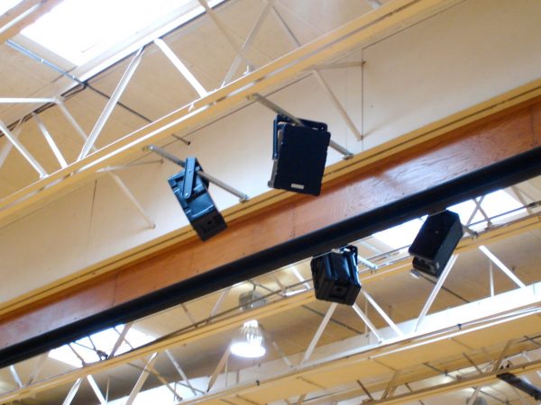technomad speakers installed on a ceiling beam